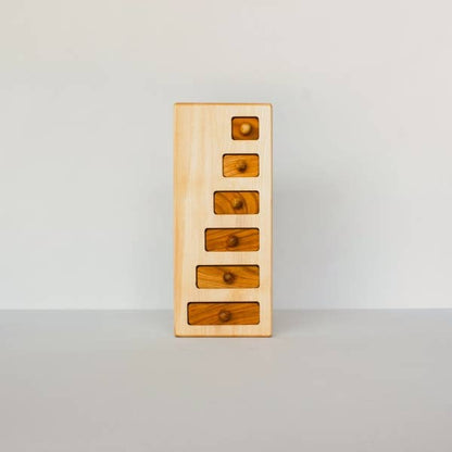 wooden story | lang-kort knoppuzzel