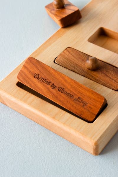 wooden story | lang-kort knoppuzzel